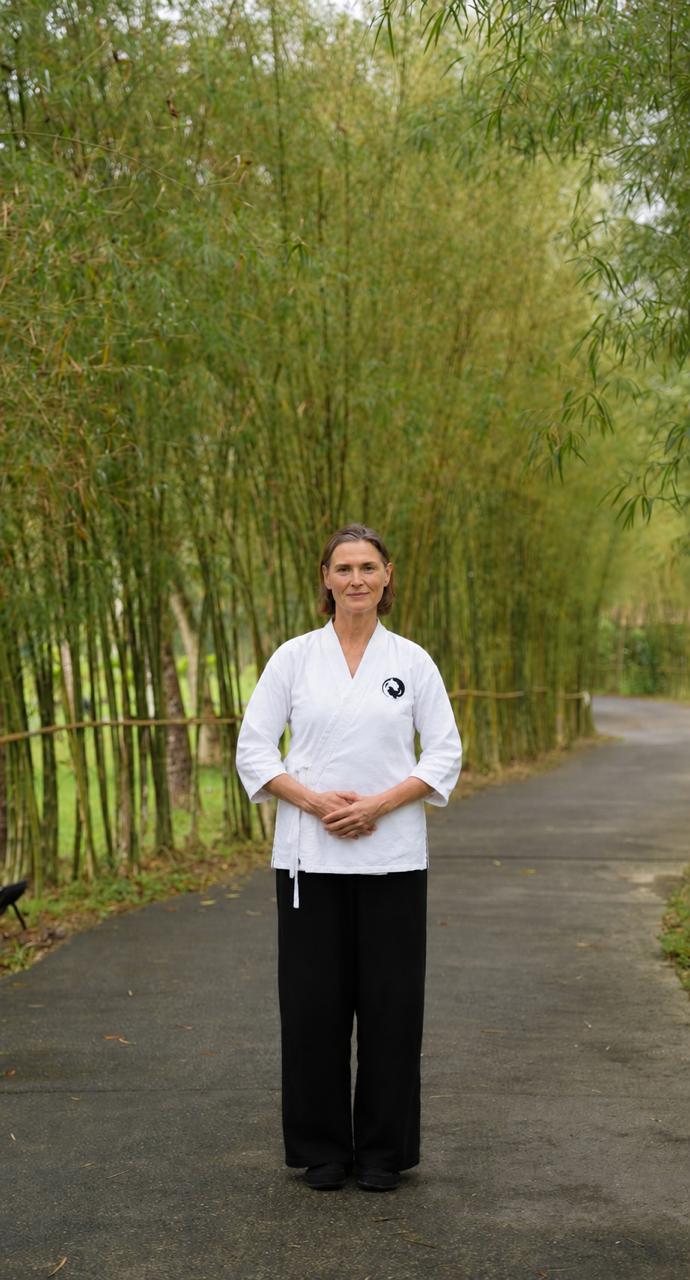 Lisa Fabry standing in a bamboo grove